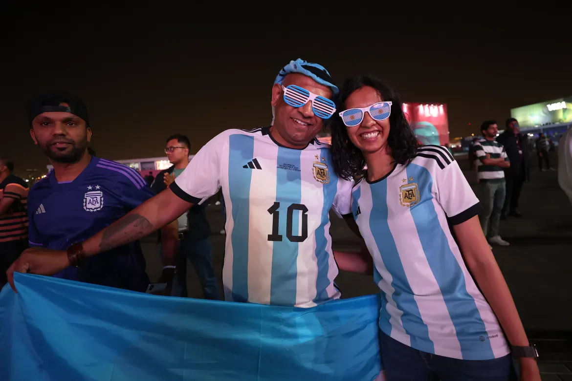 Argentina supporters celebrating in Messi #10 home jerseys