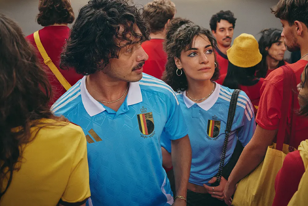 Belgium national team supporters wearing the away kit in a crowd of fans