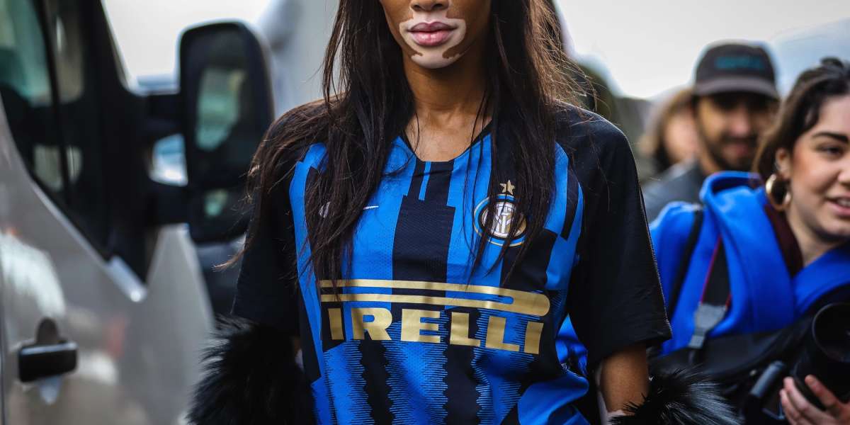 Street-style portrait of a model wearing the Inter Milan Pirelli home jersey